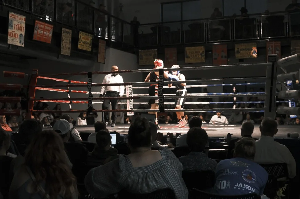 Fans watching an amateur bout at Theatre of Combat in South Jordan, Utah
